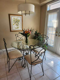 Wrought iron and glass table with 4 chairs