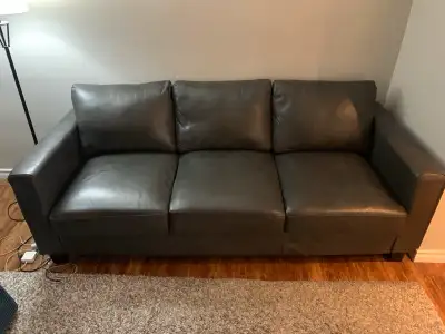 Faux leather couch, all cushions are removable fits easily through any doorway 35”H x 82”Wx 31”L In...