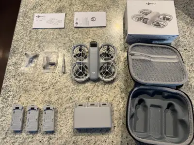 DJI NEO Drone, 3 batteries, intelligent charger, case and more, View more