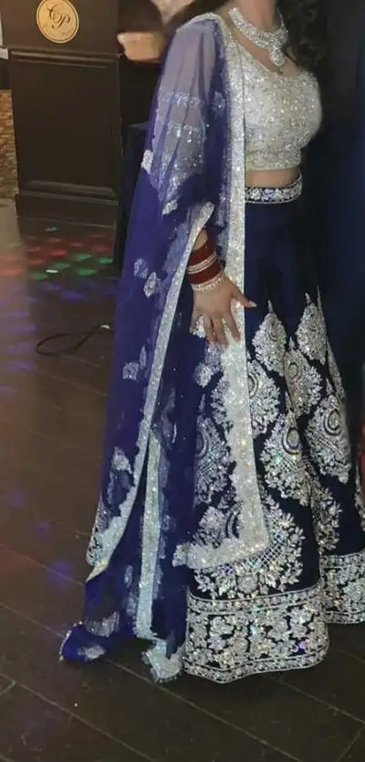 Size small/medium (can easily be tailored) Worn once Custom made in Surrey, BC Beautiful royal blue...