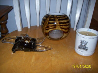 Paper weight, pen and pencil holder or flower pot and candle