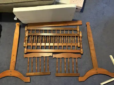 Darling antiques wooden cradle. Comes with mattress and white eyelet bumper. All screws and fixtures...