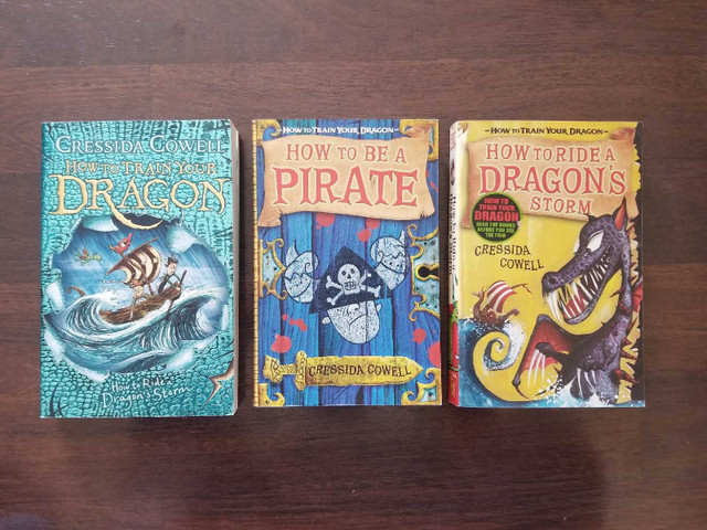 3 How to train your dragon books  in Children & Young Adult in Lethbridge