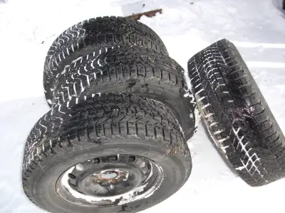 Firestone Winterforce snow tires on 5 bolt rims P235/65R16 M+S. I was told they were off a Mazda. Th...