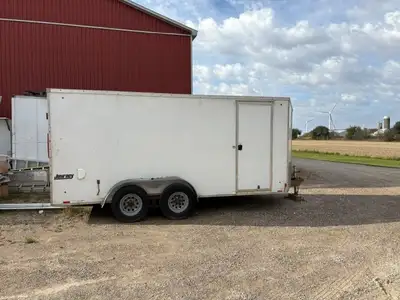 14' + 2'V nose enclosed trailer for sale.