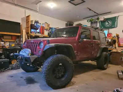 Very modified 2012 jeep wrangler sahara unlimited. Full set of 5, 35/12.50R18 nitto recon grapplers...