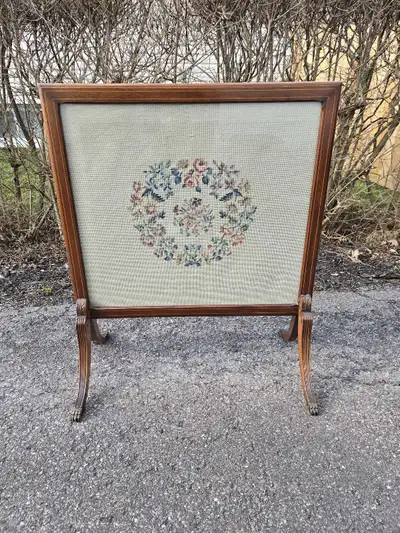 Gorgeous Fireplace screen made of wood and glass with brass claw feet. Needle point Tapestry is in v...