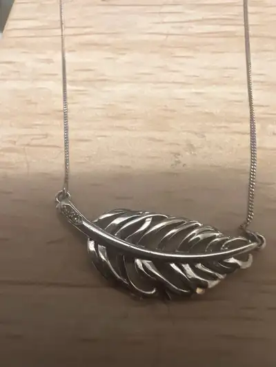 10 k leaf necklace with 2 diamonds, View more