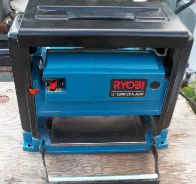 This is a mint-condition Ryobi 10 inch surface / thickness planer. Made in Japan. It comes with the...