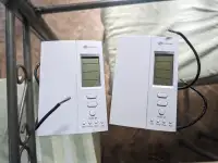 Thermostat électronique programmable blanc. Thermostat régulier