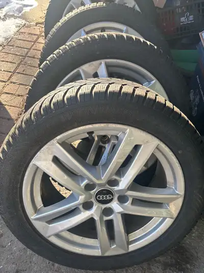 High quality 225/50/R17 Dunlop winter tires with alloy rims included.