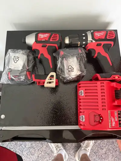 new in package Miller drill and driver , View more
