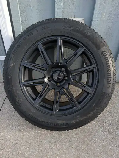 Matte black Fast rims, in like new condition. Great quality snow tires, Viking Contact 7s. Lots of t...