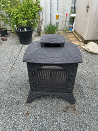 Very heavy cast iron fire pit or lawn art