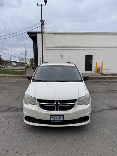 Selling my white 2011 Dodge Grand Caravan. - Mileage: ~176,800 km -Runs great, no mechanical issues...