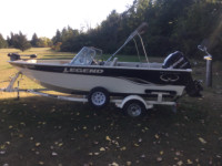 Legend 18 Xcalibur with  a Mercury 90 hp Optimax.