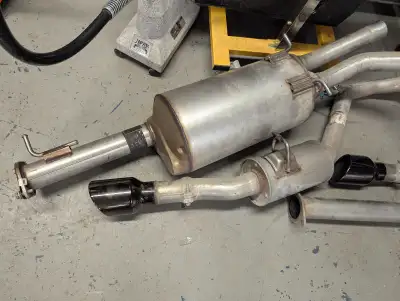 2025 Dodge ram crew cab Short box factory cat back exhaust system. Black tips only 800kms in it. Lik...