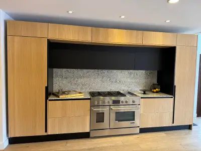 Demo kitchen in oak veneer and glass, View more