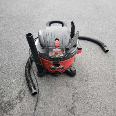 Craftsman Shop vac. 5 HP. In good shape just have 2 don't need both. Has the hose and accessories