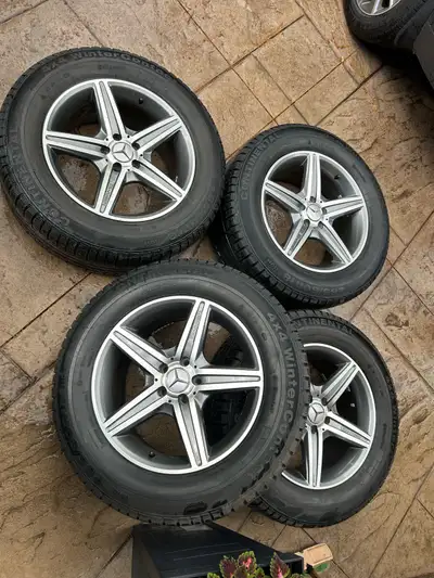 Mercedes Benz AMG OEM 18” rims with winter tires Mercedes Benz AMG OEM rims with winter tires. Bolt...