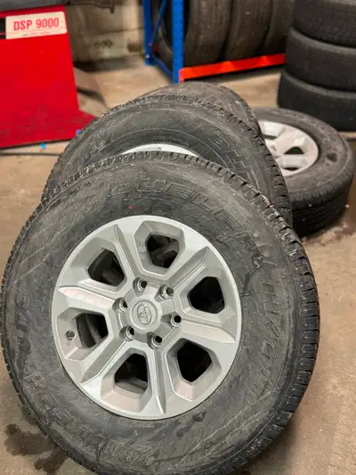 Selling basically new take offs Toyota 4 runner wheels and Bridgestone dueler tires. Please msg for...
