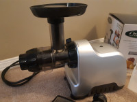 Omega Low speed masticating juicer. Used once.