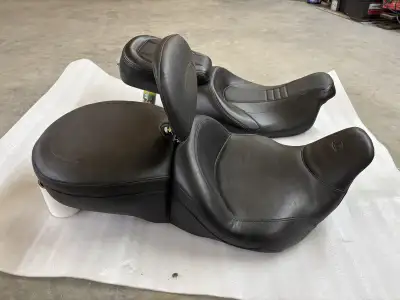 The One with the back rest is a mustang $1500 new asking $ 600 the other seat is unknown brand came...