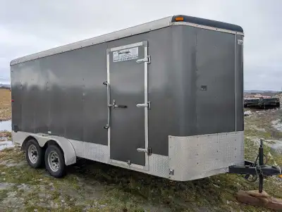 I have a 2013 TNT enclosed trailer. Drop down tailgate. 7,000 lb capacity. The rear door is 80 in hi...