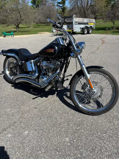 2010 softail with low mileage Bike runs great, new back tire and battery Comes with swing arm bag an...