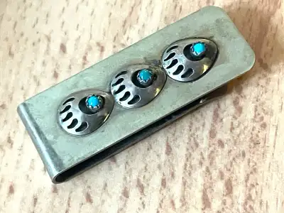 This is a vintage First Nations (Southwest Indian) sterling silver and turquoise handmade money clip...
