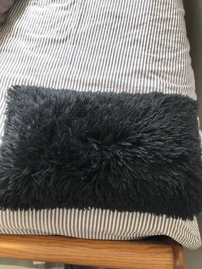small black fluffy pillow , View more