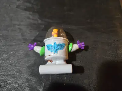 Couple of small toy figures - buzz lightyear and hamburglar