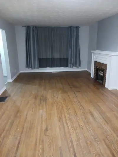 This 2-bedroom ground floor apartment has lots of character and has a covered seating area out front...