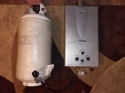 Water heater(Easily converted for natural gas), propane tank(capacity 43.2 liters). Used for house a...