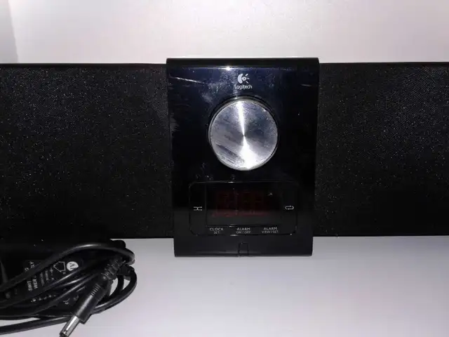 Ipod dock clock with alarm function  - $1064551240540289120