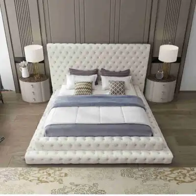This like new House of Hampton velvet king bed features a stunning, tufted design with an upholstere...
