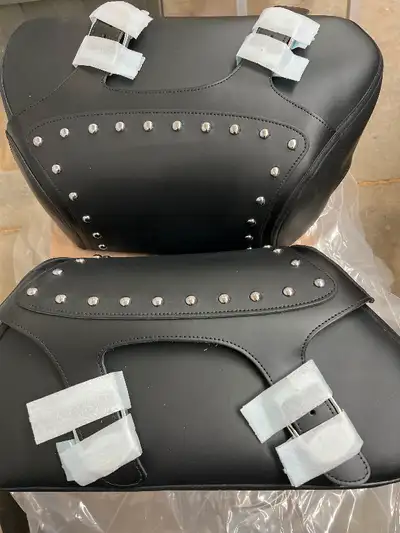 New in box Factory Original parts Yamaha Leather Saddle bags left & right hand set hardware kit also...