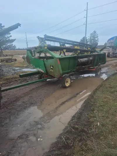 John deere combine header model 216 comes with cart lots of new parts but needs work