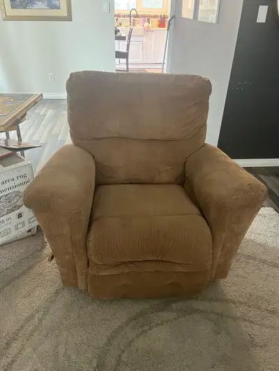 As seen in pictures. Has some wear and tear but still a comfortable chair