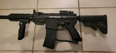 Title: Tippmann A-5 paintball gun, View more