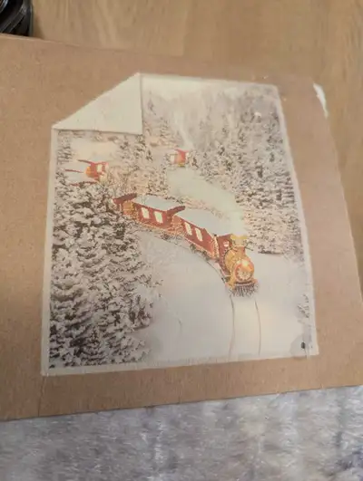 This NEW blanket is very unique. I've heardly ever seen one like it. It's got a train on it with bea...