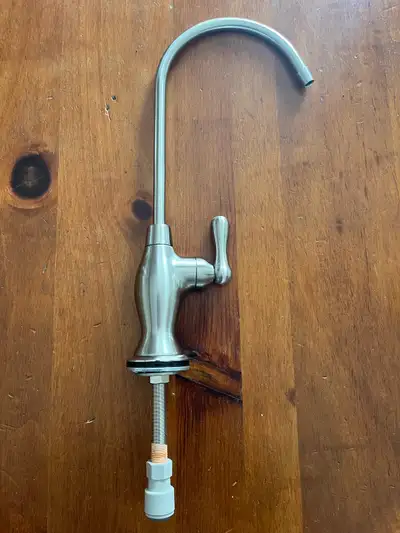 Brushed nickel drinking water faucet. Used on reverse osmosis system. In excellent condition.