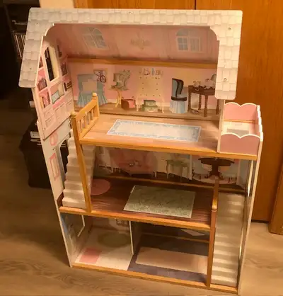 Dollhouse - size is 32 inches wide x 46 inches high x 12 inches deep . Phone 780-518-9600 . Pick it...