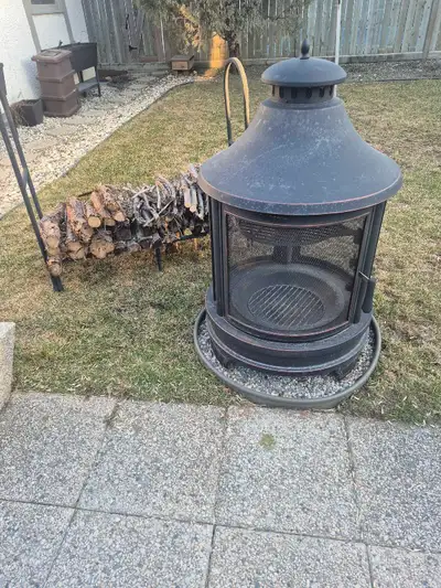 outdoor woodburning fireplace , View more