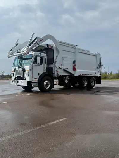 Brand new 2027 Peterbilt 520 with Heil front load on the lot and available now. -Cummins PX9 power (...