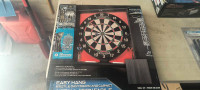 Dart board with 2 additional sets of darts 
