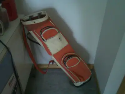 BEGINNER'S  GOLF BAG & ASSORTED CLUBS & other golf paraphenalia, View more