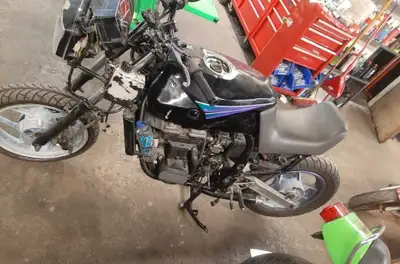 1996 Kawasaki ZX600 project bike. Not currently running. Active Alberta title. Needs carburetors reb...