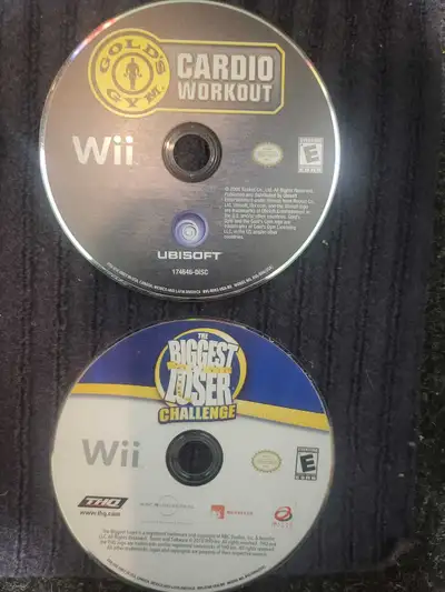 Get ready to sweat with these used Wii fitness games! Included are Gold's Gym Cardio Workout and The...