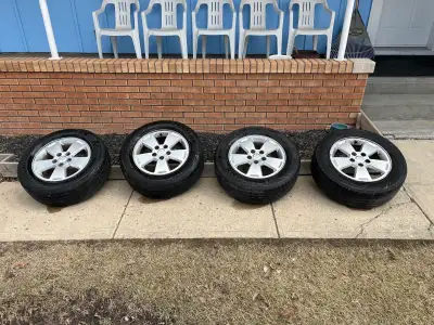 4 x 225/60R16 summer tires and rims in very good condition $650 obo. Tires used for one summer on 20...